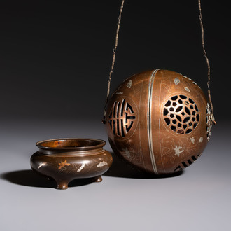 A Chinese or Vietnamese silver-inlaid copper reticulated spherical censer and a silver- and copper-inlaid bronze tripod censer, 19th C.