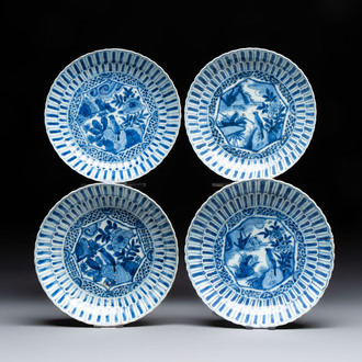 Four Chinese 'Kraak' blue and white plates with a bird on a rock, Wanli