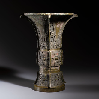 A Chinese archaic bronze wine vessel with Taotie design, Zun 尊, late Shang