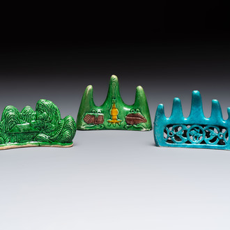 Three Chinese verte biscuit and turquoise-glazed brush rests, Kangxi and later