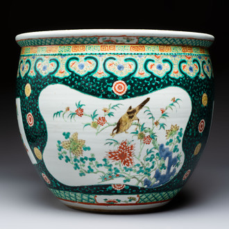 A Chinese famille verte black-ground jardinière with birds, antiquities and flowers, 19th C.