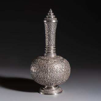 A Thai or Cambodian silver water flask and cover with floral design, late 19/early 20th C.