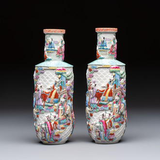 A pair of Chinese famille rose relief-moulded 'Immortals' vases, Qianlong mark, Republic