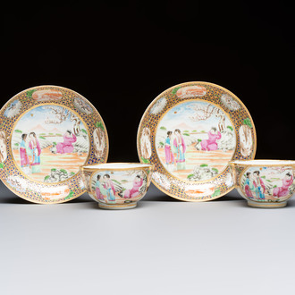 A pair of Chinese Canton famille rose cups and saucers with figural design, Daoguang