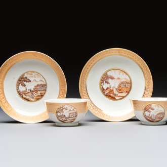 A pair of Chinese gilt-decorated sepia 'Riverscape' cups and saucers, Jiaqing