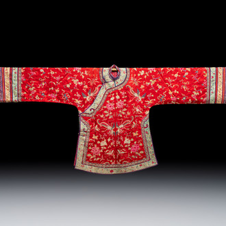 A Chinese embroidered silk red-ground women's robe, 19th C.