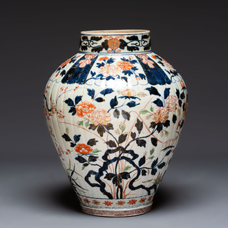 A large Japanese Imari baluster vase with floral relief design, Edo, ca. 1700