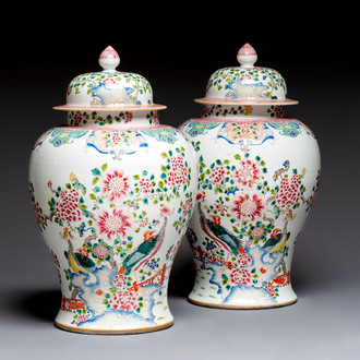 A pair of Chinese famille rose 'Phoenixes among Flowering Branches' vases and covers, 20th C.