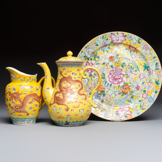 A Chinese famille rose yellow-ground 'Dragon' covered teapot, a milk jug and a 'Millefleurs' plate, Qianlong marks, Republic