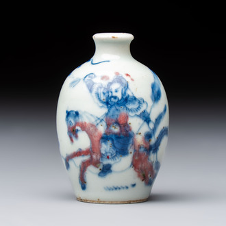A Chinese blue, white and copper-red 'Romance of the Three Kingdoms' snuff bottle, Yongzheng mark, 19th C.