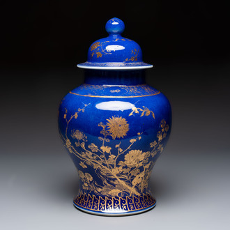 A Chinese gilt-decorated powder-blue-ground vase and cover, Kangxi mark, 19th C.