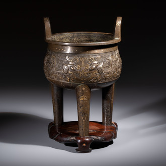 A rare Chinese gold- and silver-inlaid bronze 'Ding' censer with Taotie design on a hongmu stand, Shaosheng 紹聖 and Su Zhe 蘇轍 mark, Song or later