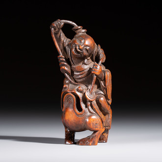 A small Chinese carved bamboo group of 'Liuhai', 19th C.