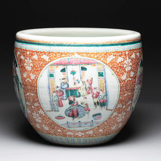 A large Chinese famille rose iron-red-ground fish bowl with narrative design, 19th C.