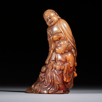 A Chinese carved buffalo horn 'Hehe Erxian' group, 17/18th C.