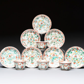 Four Chinese famille verte cups and seven saucers, 19th C.