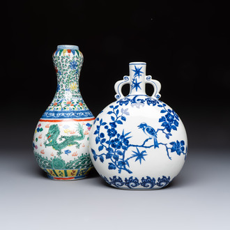 A Chinese blue and white moonflask vase and a wucai garlic-mouth bottle vase, Yongle and Wanli mark, 20th C.