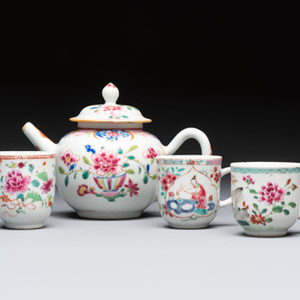 A Chinese famille rose teapot and cover with floral design and three cups, Qianlong