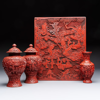 A Chinese cinnabar lacquer plaque, a vase, and a pair of covered vases, 19/20th C.