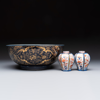 A gilt-decorated powder-blue-ground punch bowl and a pair of Imari-style jars, Samson, Paris, 19th C.