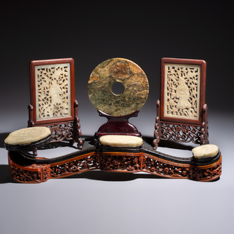 A pair of Chinese jade-inset wooden table screens, a jade-inset wooden ruyi with its original stand and a jade 'bi' disc on a wooden stand, 19/20th C.