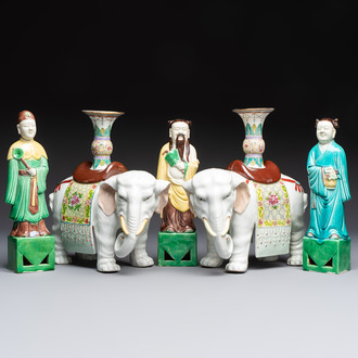 A pair of Chinese famille rose elephants carrying a 'Gu' vase and three sancai-glazed immortals, 20th C.