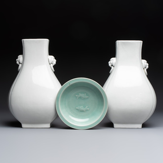 A pair of Chinese white-glazed 'Hu' vases and a Longquan celadon 'Twin Fish' plate, 20th C.