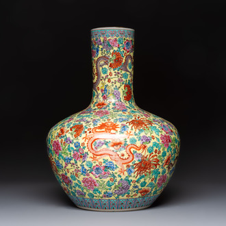 A Chinese famille rose yellow-ground 'Tianqiu Ping' vase with dragons and flowers, 20th C.