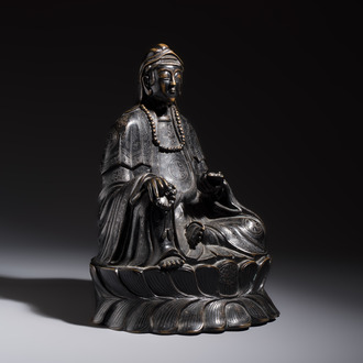 A Chinese bronze Bodhisattva seated on a lotus throne, 20th C.