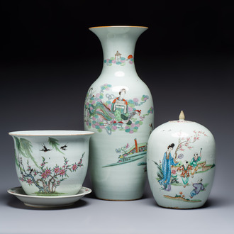 A Chinese famille rose vase, a covered jar and a jardiniere with stand, 19/20th C.
