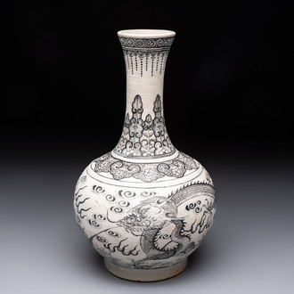 A Chinese black-enamelled biscuit 'Dragon' vase, Kangxi mark, 19th C.