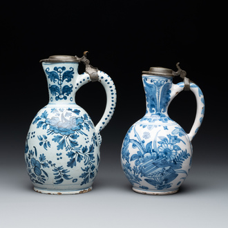 Two blue and white Dutch Delft jugs with pewter lids, 17/18th C.