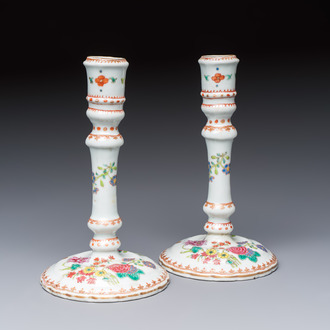 A pair of Chinese famille rose candlesticks with floral design, Qianlong