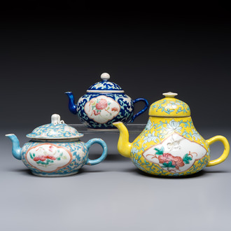 Three Chinese famille rose blue- and yellow-ground teapots and covers for the Straits or Peranakan market, Tongzhi marks, 19th C.