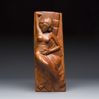 A Balinese carved wooden sculpture of a reclining lady, first half 20th C.