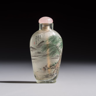 A Chinese inside-painted glass snuff bottle with two men wearing straw raincoats, dated 1911