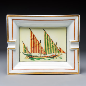 A gilt and polychrome-decorated porcelain 'Yacht' ashtray, Hermès, 20th C.