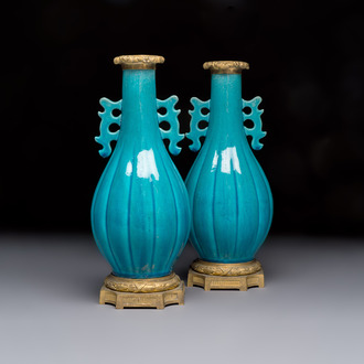 A pair of gilt-bronze-mounted Chinese turquoise-glazed vases, 19th C.