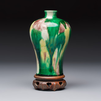 A Chinese sancai-glazed 'Meiping' vase on a wooden stand, 19th C.