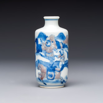 A Chinese blue, white and copper-red snuff bottle with narrative design, 19th C.