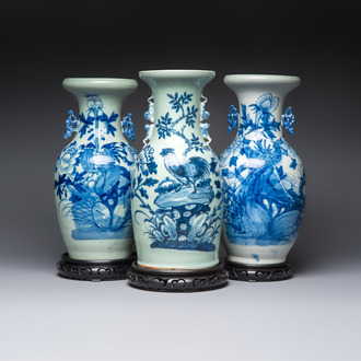 Two Chinese blue and white celadon-ground vases and a blue and white vase, on wooden stands, 19th C.