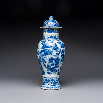 A Chinese blue and white covered vase with figures in landscapes, Kangxi