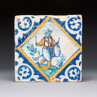 A polychrome Dutch Delft maiolica 'Drummer' diamond tile, 16th C.
