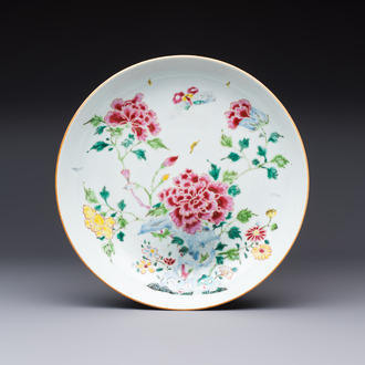 A Chinese famille rose 'Peonies' plate, Yongzheng/Qianlong