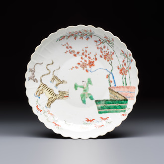 A Chinese famille verte Kakiemon-style 'Boy and Tigers' lobed dish, Kangxi