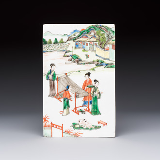 A Chinese famille verte 'Rice and Silk Production' plaque, 19th C.