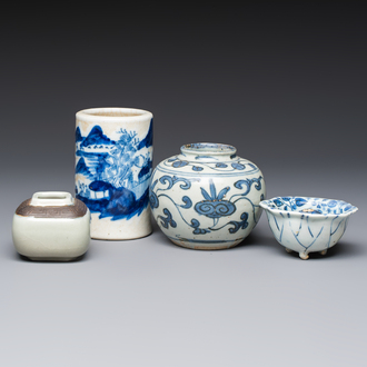 A Chinese Nanking water pot, a blue and white brush pot, a jarlet and a trick cup, Ming and later