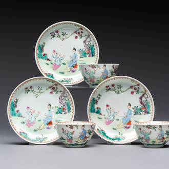 Three sets of Chinese famille rose 'Elegant Beauty and Boy' cups and saucers, Qianlong