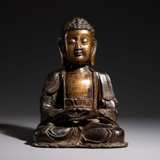A Chinese bronze seated Buddha, Ming