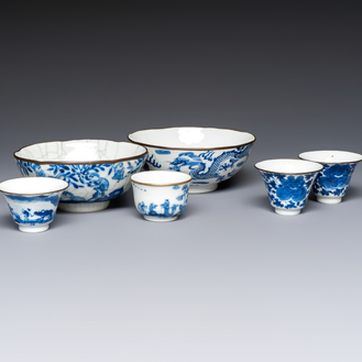 Four Chinese blue and white 'Bleu de Hue' cups and two bowls, various marks, 19th C.
